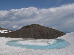 Snowmelt pool at base of glacial moraine