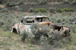 Abandoned car among Big Sagebrush